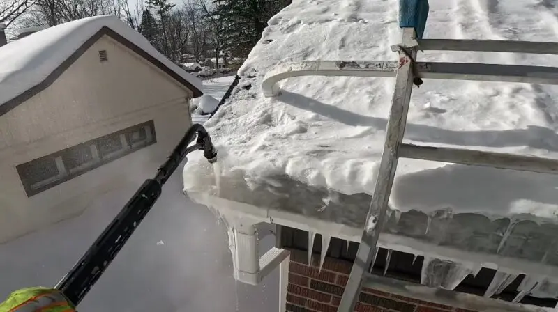 Removing winter's icy grip from the roofline