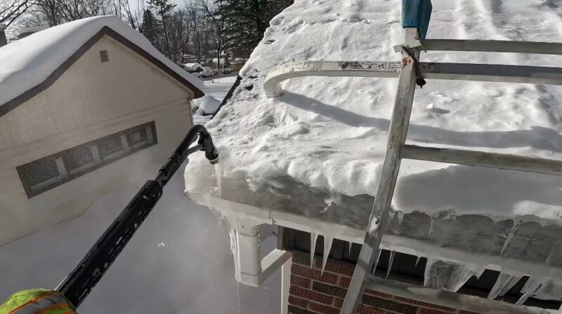 Removing winter's icy grip from the roofline